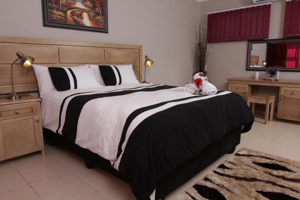Casa Bianca Guest Lodge Hartbeespoort Pokoj fotografie